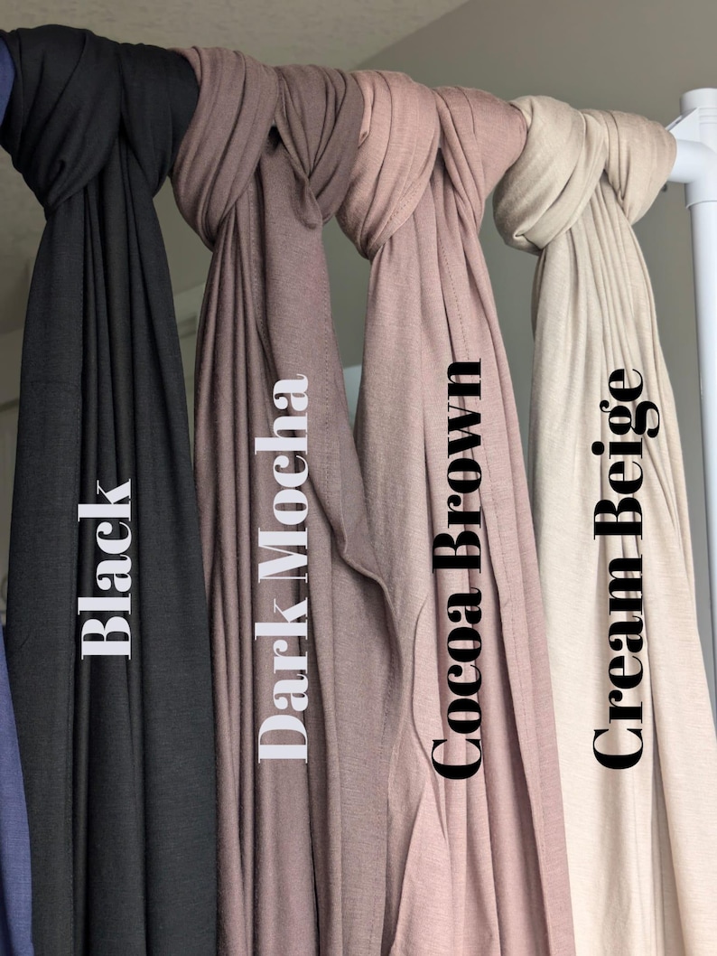 Jersey hijab for women, Muslim headscarf, soft stretchy hijab for daily wear

Plain jersey hijab, breathable modest head wrap, perfect for work or prayer

Non-slip stretch jersey hijab, easy to style Muslim head covering

Everyday jersey hijab, comfortable and elegant modest fashion accessory