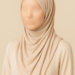 Jersey hijab for women, Muslim headscarf, soft stretchy hijab for daily wear

Plain jersey hijab, breathable modest head wrap, perfect for work or prayer

Non-slip stretch jersey hijab, easy to style Muslim head covering

Everyday jersey hijab, comfortable and elegant modest fashion accessory