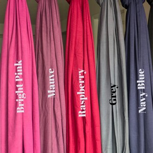 Jersey hijab for women, Muslim headscarf, soft stretchy hijab for daily wear

Plain jersey hijab, breathable modest head wrap, perfect for work or prayer

Non-slip stretch jersey hijab, easy to style Muslim head covering

Everyday jersey hijab, comfortable and elegant modest fashion accessory