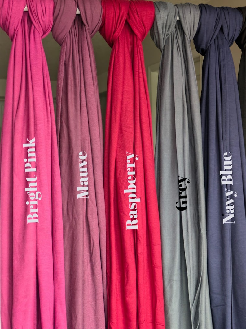 Jersey hijab for women, Muslim headscarf, soft stretchy hijab for daily wear

Plain jersey hijab, breathable modest head wrap, perfect for work or prayer

Non-slip stretch jersey hijab, easy to style Muslim head covering

Everyday jersey hijab, comfortable and elegant modest fashion accessory