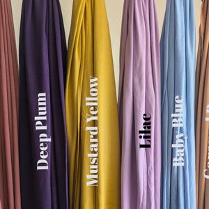 Jersey hijab for women, Muslim headscarf, soft stretchy hijab for daily wear

Plain jersey hijab, breathable modest head wrap, perfect for work or prayer

Non-slip stretch jersey hijab, easy to style Muslim head covering

Everyday jersey hijab, comfortable and elegant modest fashion accessory