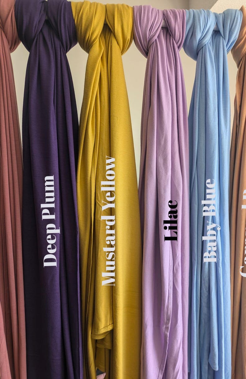 Jersey hijab for women, Muslim headscarf, soft stretchy hijab for daily wear

Plain jersey hijab, breathable modest head wrap, perfect for work or prayer

Non-slip stretch jersey hijab, easy to style Muslim head covering

Everyday jersey hijab, comfortable and elegant modest fashion accessory