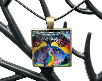 Embrace the Spectrum: Handcrafted Rainbow Tree Goddess Cabochon Pendant