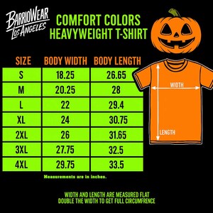 May include: Orange heavyweight t-shirt with a pumpkin graphic. The image includes a size chart with body width and length measurements in inches, ranging from S to 4XL. The text reads "COMFORT COLORS HEAVYWEIGHT T-SHIRT".
