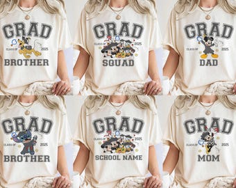 May include: Cream-coloured t-shirts with the word "GRAD" in a grey, collegiate-style font. Each shirt features a different Disney character graphic and text: "Brother," "Squad," "Dad," "Brother," "School Name," and "Mom," with "Class of 2025."