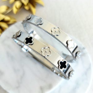 Bracelet jonc trèfle argenté en acier inoxydable - Bracelet manchette en argent - Bracelet superposé pour femme - Bracelet trèfle minimaliste, cadeau d'anniversaire