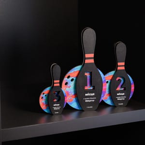 This Personalized Wooden Bowling Trophy with acrylic details is a stunning custom award, perfect for recognizing excellence in bowling leagues and corporate sports events.