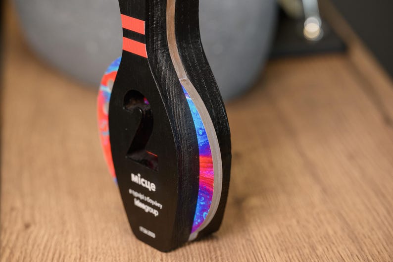 This Personalized Wooden Bowling Trophy with acrylic details is a unique custom award for bowling events. A great corporate sports gift for recognizing top players and tournament winners.