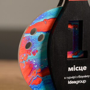 Honor bowling excellence with this Personalized Wooden Bowling Trophy, a sleek custom award with acrylic details. A perfect corporate sports gift for leagues, competitions, and team recognition.