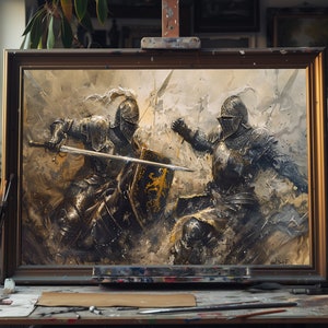 May include: An oil painting of two knights in full armor engaged in combat, displayed on an easel in an artist's studio. The artwork features a gold frame and depicts a dynamic battle scene with swords and shields.