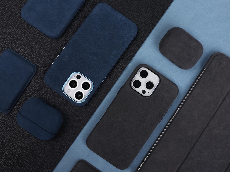 May include: Assortment of phone cases and AirPod cases in blue and black suede fabric. The cases have a textured finish and are designed to protect electronic devices.