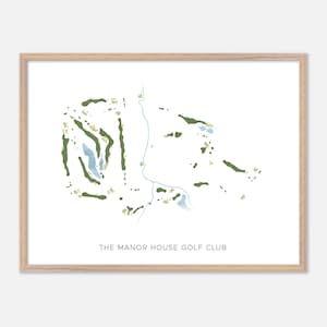 May include: A framed print of a golf course layout, showing green fairways and blue water features, set within a light brown frame. The text "THE MANOR HOUSE GOLF CLUB" is printed at the bottom.