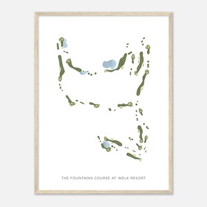 May include: A white framed print of a golf course map with green and blue colors. The text "THE FOUNTAINS COURSE AT WELK RESORT" is at the bottom of the print.