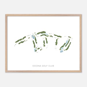 May include: A framed print featuring a golf course map. The course layout is depicted in green and blue against a white background. The text "ESCENA GOLF CLUB" is printed in a simple font at the bottom of the print. The frame is made of light-colored wood.