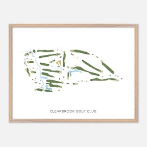 May include: A framed print of a golf course map. The map features green fairways, blue water features, and tan sand traps against a white background. The text "CLEARBROOK GOLF CLUB" is printed at the bottom.