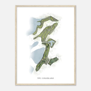 May include: A framed watercolor print of the TPC Colorado golf course. The artwork features a detailed map of the course with green fairways, water features, and the text "TPC COLORADO" at the bottom.