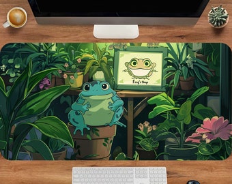 May include: A green frog sitting in a pot with green plants and flowers around it. A sign above the frog reads "Frog's Shop".