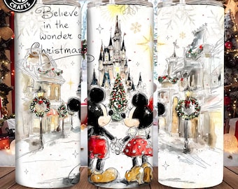 May include: Three white insulated tumblers with Christmas designs. One has the text "Believe in the wonder of Christmas." The other two feature Mickey and Minnie Mouse in front of a castle and Christmas tree.
