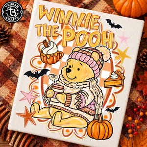May include: A rectangular canvas print featuring a yellow Winnie the Pooh character wearing a pink knit hat and scarf, holding a coffee cup. The design includes orange pumpkins, a slice of pie, black bats, and stars with the text WINNIE THE POOH.