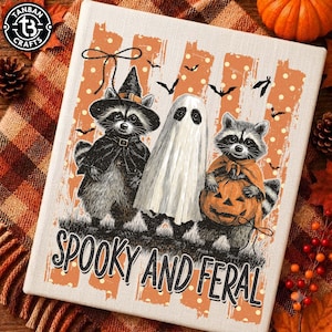 May include: A rectangular canvas print featuring two raccoons and a ghost. One raccoon wears a witch hat, the other holds a jack-o'-lantern. The background has orange stripes with white polka dots, black bats, and the text SPOOKY AND FERAL.