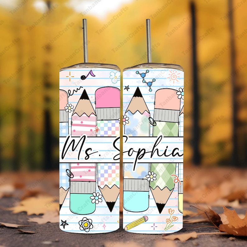 May include: Two stainless steel tumblers with a pencil and eraser design, featuring the name "Ms. Sophia" on a lined paper background. The design includes colorful geometric patterns, flowers, and science-themed graphics.