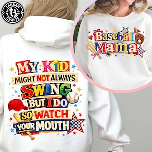 May include: White sweatshirt with baseball-themed graphics. One design reads "My Kid Might Not Always Swing But I Do So Watch Your Mouth" with baseball bat, ball, and cap illustrations. The other says "Baseball Mama" with baseball bat, ball, glove, and star graphics.