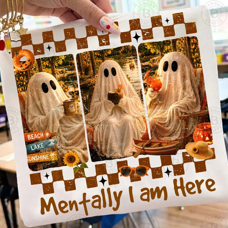 May include: White t-shirt with a three-panel design featuring ghost figures enjoying drinks in a scenic setting. The text "Mentally I am Here" is printed in brown. Includes a sunflower, sunglasses, and a small boat.
