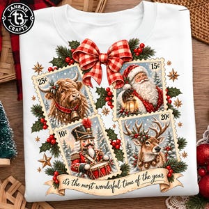 May include: A white sweatshirt featuring a graphic of four postage stamp-style illustrations depicting a Highland cow, Santa Claus, a nutcracker, and a reindeer, accented with holly, berries, and a red plaid bow, with the text "it's the most wonderful time of the year."