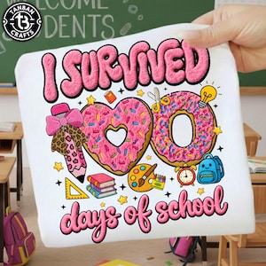 May include: White t-shirt with the text "I SURVIVED 100 days of school" in pink, featuring a heart-shaped donut and a donut with the number zero. Includes school-themed graphics like a pencil, books, and a backpack.