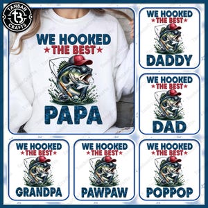 May include: White sweatshirt with a graphic of a fish wearing a red cap and sunglasses, with the text "WE HOOKED THE BEST" and the word "PAPA" in blue. Additional designs include "DADDY", "DAD", "GRANDPA", "PAWPAW", and "POPPOP".