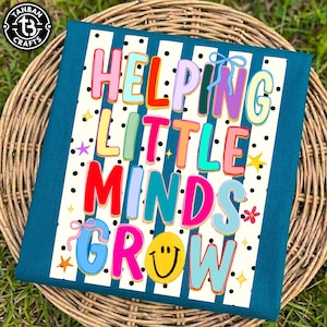May include: A teal-colored fabric with the words "HELPING LITTLE MINDS GROW" in colorful, bubble letters. The design includes a striped background with black polka dots, stars, and a smiling face. The item is displayed on a woven basket.