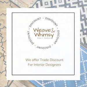 This handwoven wool flatweave rug features warm amber tones in a mesmerizing striped pattern