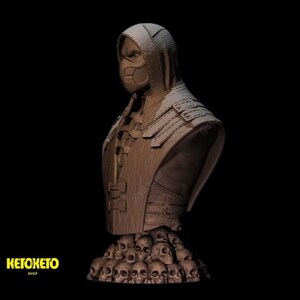 May include: A brown 3D printed bust of a hooded figure wearing a mask. The bust is standing on a base of skulls.