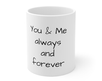May include: White ceramic mug with black text that reads "You & Me always and forever".