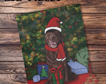 May include: A Christmas-themed jigsaw puzzle featuring a brown Labrador wearing a Santa hat and scarf. The puzzle shows the dog sitting in front of wrapped gifts and a Christmas tree. The puzzle has 252 pieces.
