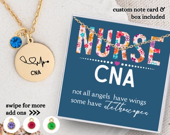 May include: Gold necklace with a round pendant that says "CNA" and has a stethoscope and heartbeat graphic. The necklace comes in a blue box with a floral design and the text "NURSE CNA not all angels have wings some have stethoscopes".