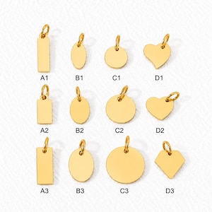 May include: A collection of twelve gold-toned metal jewellery charms arranged in a grid, labelled A1 through D3. The shapes include rectangles, ovals, circles, hearts, and a diamond, each featuring a small circular jump ring at the top for attachment.