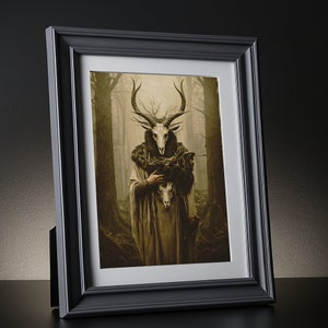 May include: Framed art print featuring a figure with a deer skull mask and antlers, set against a misty forest backdrop. The artwork has a sepia tone, and the figure wears a fur-lined cloak. The black frame adds a contrasting border to the artwork.