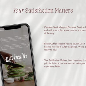 May include: A smartphone displays the words "gut health" in white script. The screen shows text about gut health, including "Include a variety of fruits, vegetables, whole grains and fermented foods to promote a diverse microbiome."
