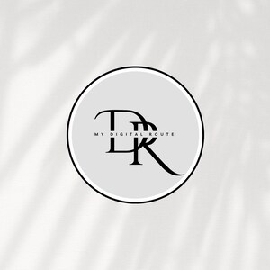May include: A white circle with a black outline and the text "MY DIGITAL ROUTE" in black. Inside the circle are the letters "D" and "R" overlapping.