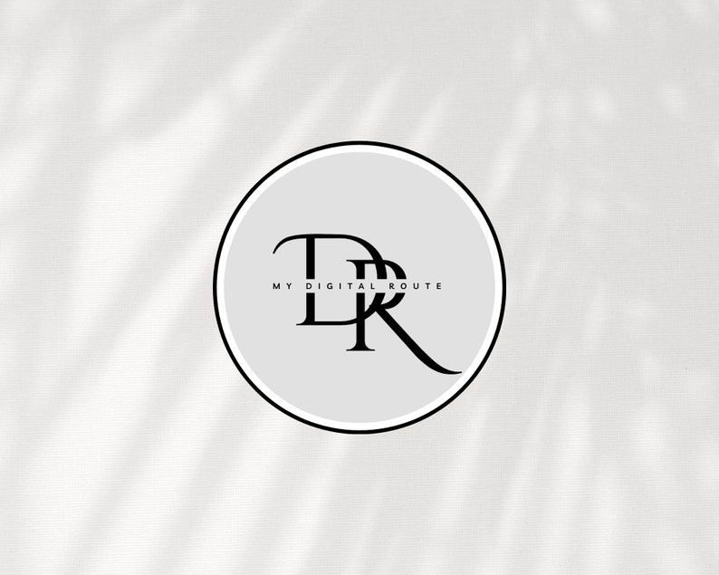 May include: A white circle with a black outline and the text "MY DIGITAL ROUTE" in black. Inside the circle are the letters "D" and "R" overlapping.