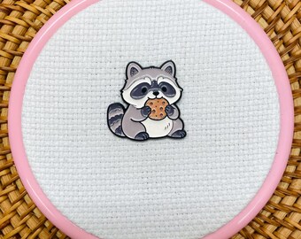 Patrón de bordado/punto de cruz con diseño de mapache hambriento
