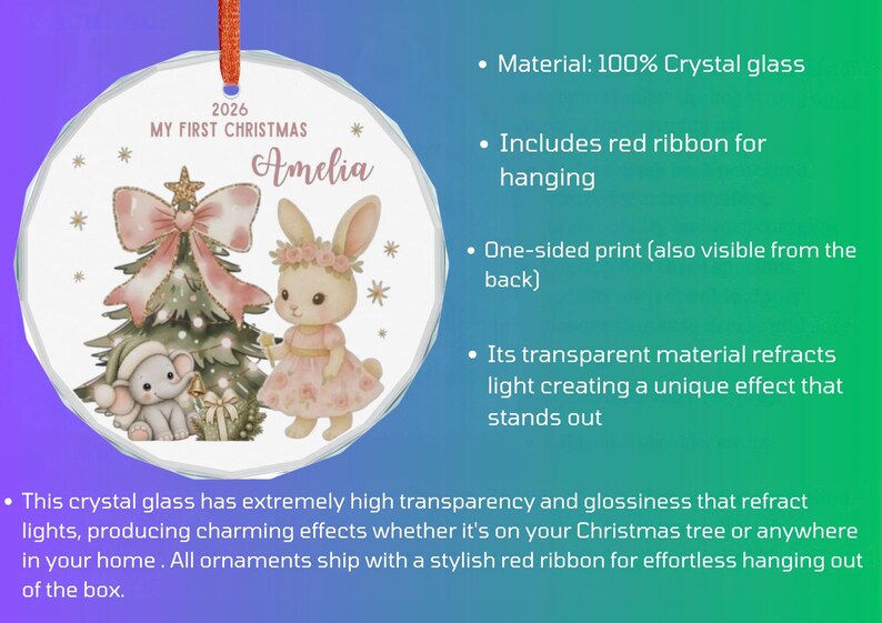 May include: A round crystal glass ornament featuring a printed illustration of a Christmas tree, a small elephant, and a rabbit wearing a floral crown. The text reads 2026 MY FIRST CHRISTMAS and the name Amelia. It includes a red ribbon for hanging.