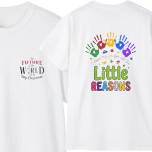 May include: A white t-shirt featuring a front chest graphic that reads The FUTURE of the WORLD is in My Classroom and a back graphic with colorful handprints, small icons, and the text I love my job for all the Little REASONS.