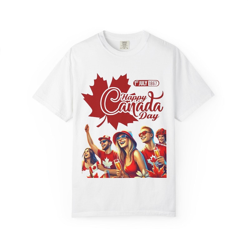 May include: White t-shirt with a red maple leaf and the words "Happy Canada Day" in a script font. The shirt features an illustration of people celebrating, holding drinks, and wearing red and white.