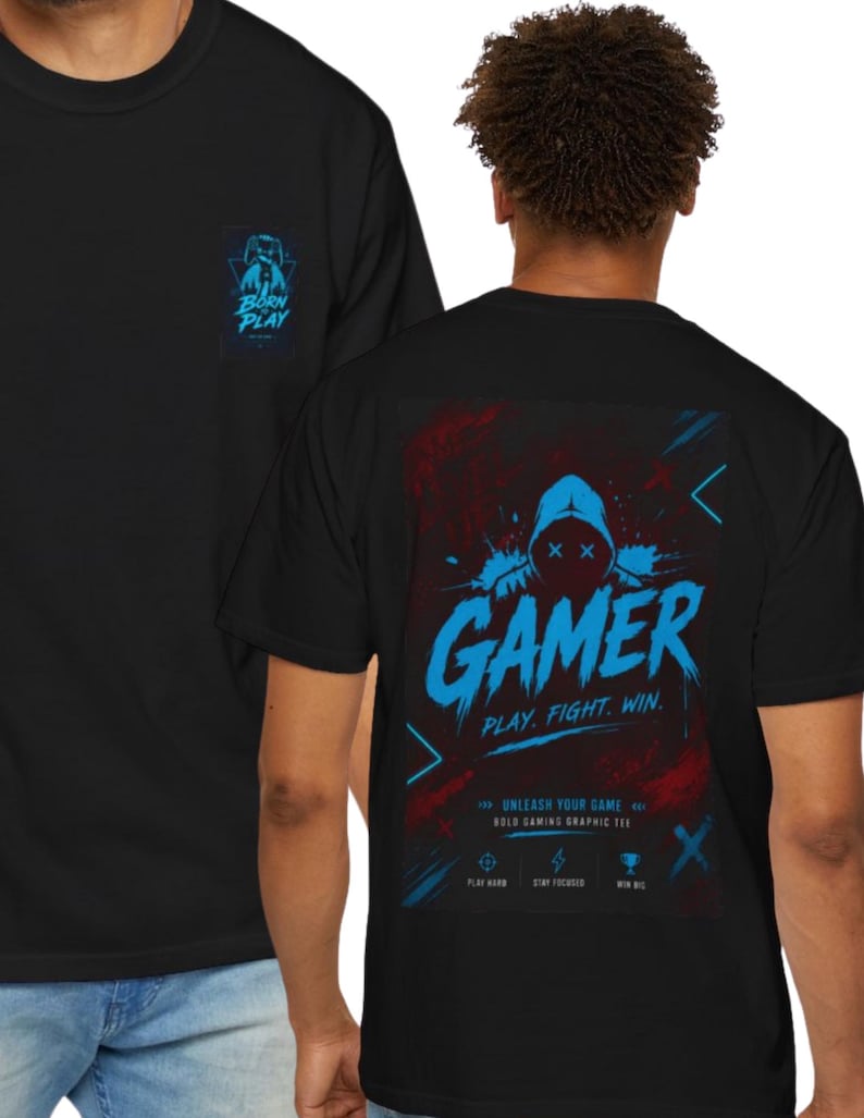 May include: A black t-shirt featuring a small graphic on the front chest with the text BORN TO PLAY. The back displays a large graphic with a hooded figure, the word GAMER, the text PLAY. FIGHT. WIN., and additional gaming-themed icons and text.