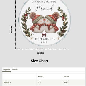 May include: A round glass Christmas ornament featuring two snowmen wearing red and green hats and scarves, with the text "OUR FIRST CHRISTMAS Married", "EMILY & THOMAS", and "2026". The ornament measures 3.00 inches in width and 3.00 inches in height.