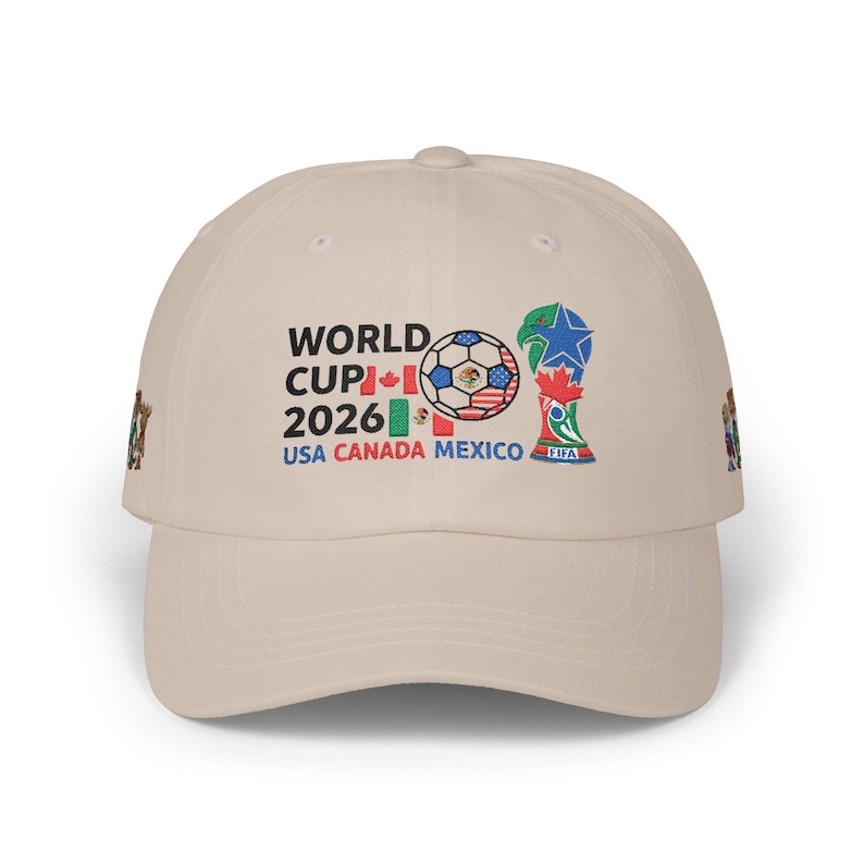 May include: Light blue baseball cap with the text "WORLD CUP 2026 USA CANADA MEXICO" and a soccer ball graphic. The cap also features the FIFA logo and flags of the USA, Canada, and Mexico.
