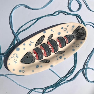Oval plate with fish illumination