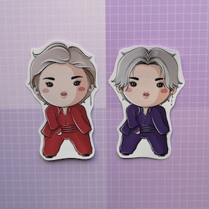 May include: Two cartoon stickers of people with gray hair. One person is wearing a red outfit and the other is wearing a purple outfit.